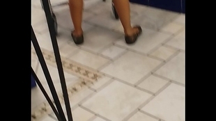 Candid latina butt cut-offs at the laundry mat with flats